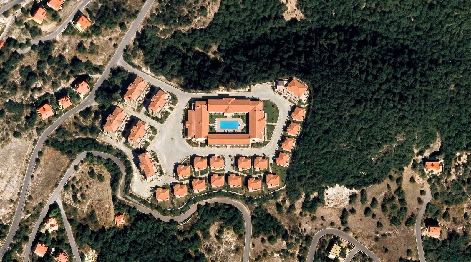 The site seen from the north west, with a resort arranged along the existing contour