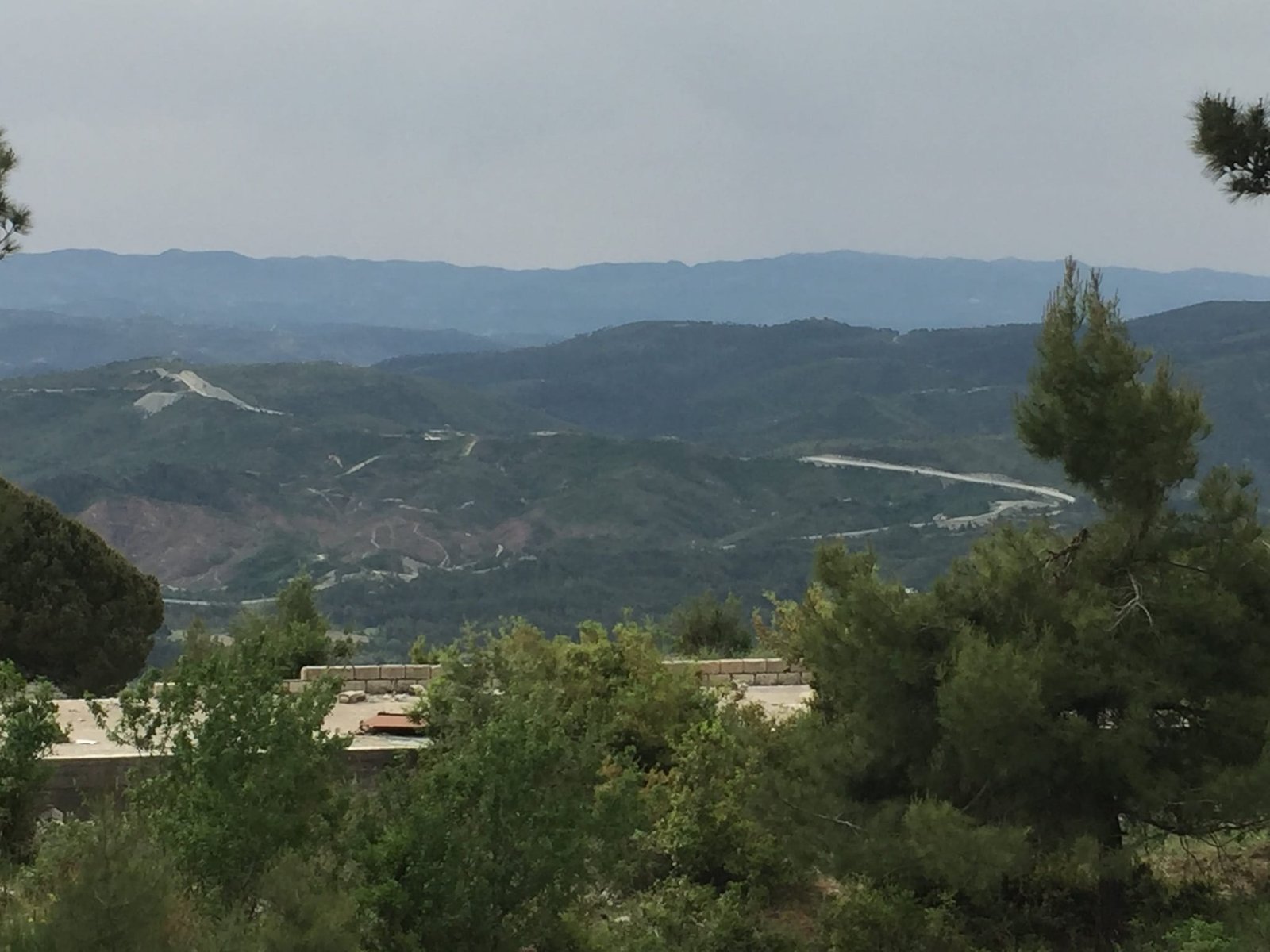The valley from the western edge of the parcel, ridges fading into haze